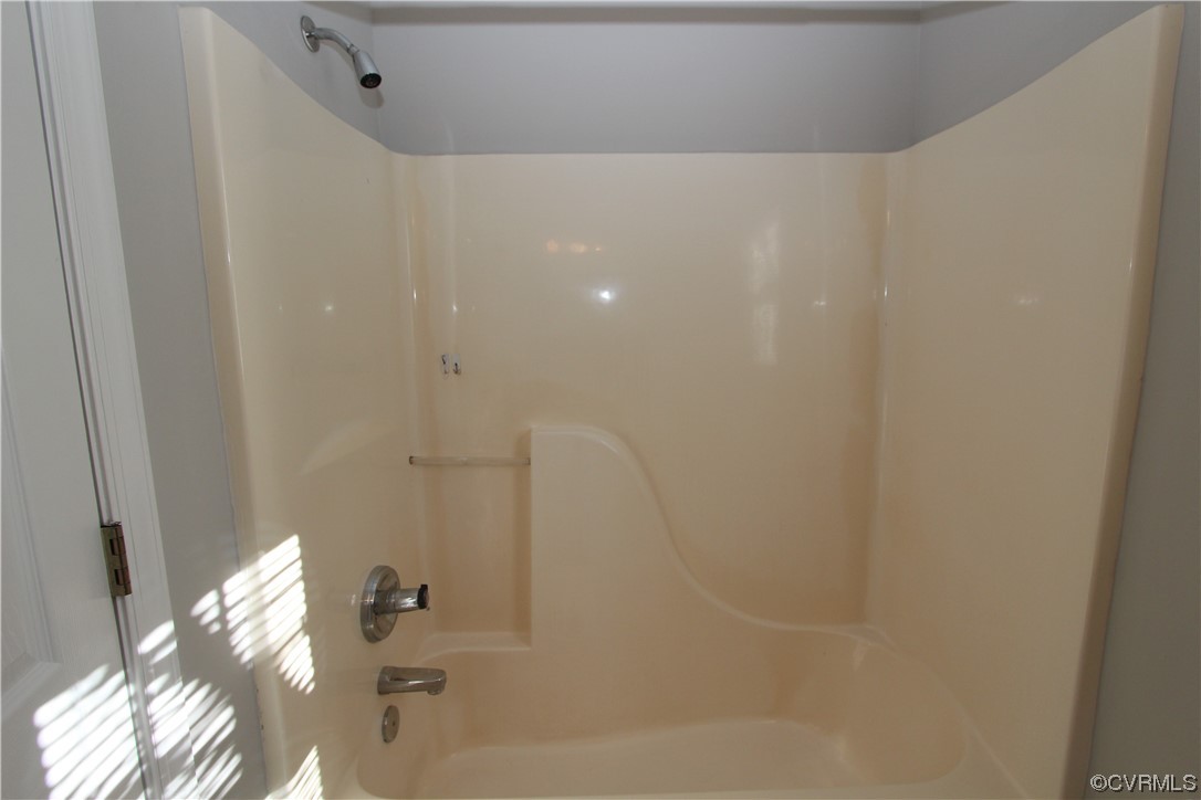Upstairs hall bath tub/shower combination