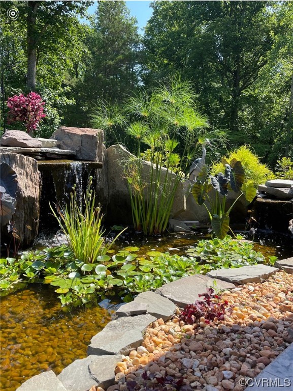 pond/waterfall feature in the rear yard