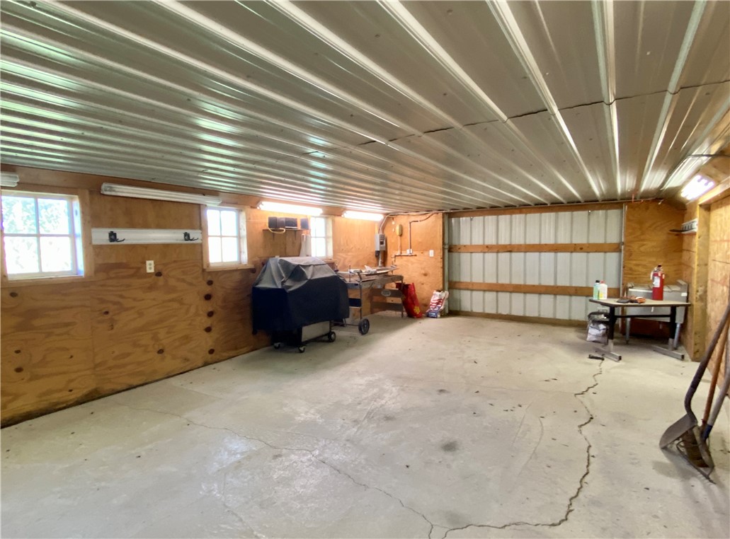36'x16' Storage area with overhead door of barn/utility building
