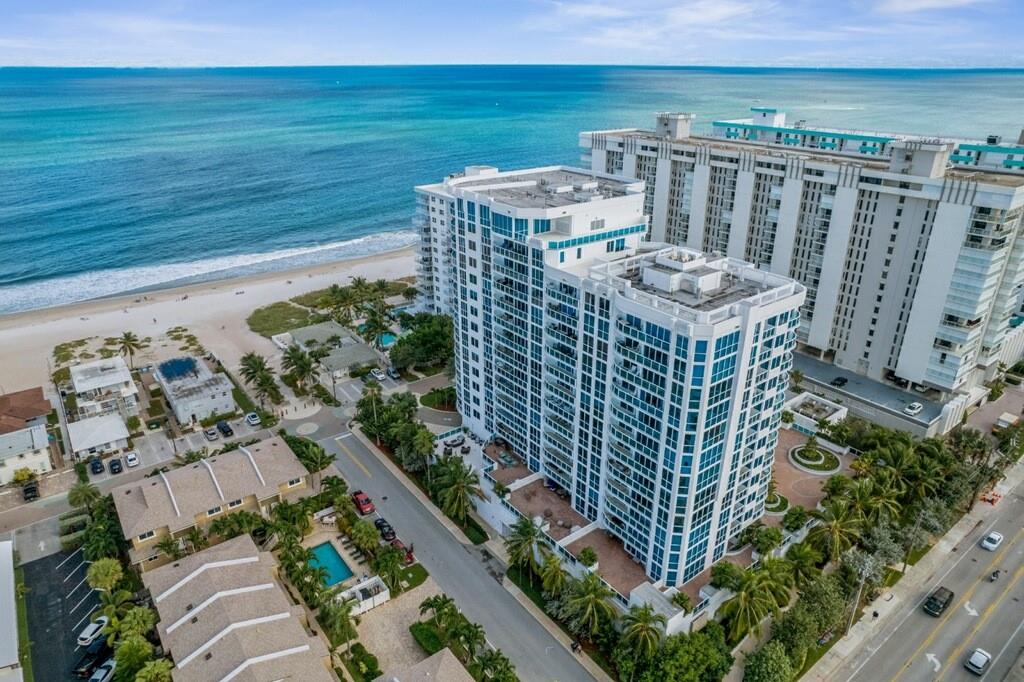 Fabulous Designer Beach Condo!. 2 bedrooms and 2.5 bathrooms corner unit with views of the ocean from this sprawling 2,500 square feet + of living space. Very spacious & bright. 9' ft ceilings. Floor to ceiling windows. Open kitchen with granite counter tops & back splash. 3 balconies. Private elevator opens to your private foyer. 24 hr security. Custom closets. Large laundry room inside the unit. Extra large Storage locker just next to unit. Heated private pool directly on the beach. Exercise facility w/ wet & dry saunas. Community room with large balcony and BBQ grill area. Can be purchased furnished and turn key.