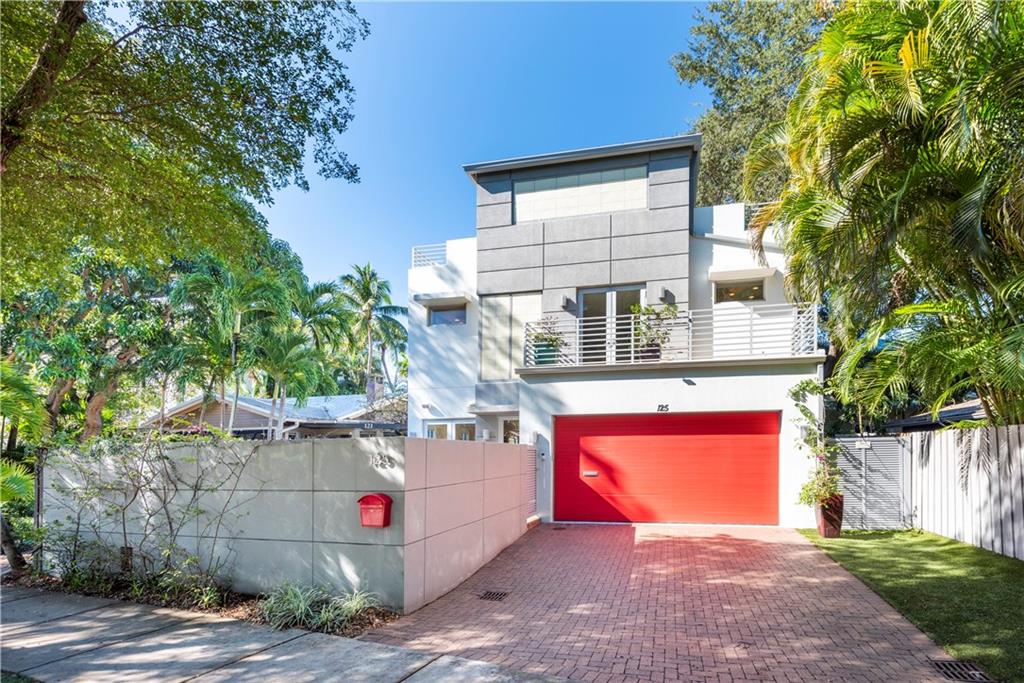 Contemporary, architecturally designed residence in quiet, desirable location within Victoria Park neighborhood. Walk to Las Olas Blvd & a short ride to the beach. Incorporating both indoor & outdoor living areas, this 3-level home features elevator, high ceilings throughout, limestone floors, impact windows, 2 very spacious primary suites, both with balconies plus a third ensuite bedroom, pool & gourmet kitchen with gas range. A grand primary suite encompassing the entire third level creates a luxurious sanctuary with large bathroom & 2 private terraces. The second level bedrooms are complemented by a wonderful loft/family room/office. The first floor blends the open indoor & outdoor spaces, perfect for entertaining. Air-conditioned garage. No HOA. A must see.