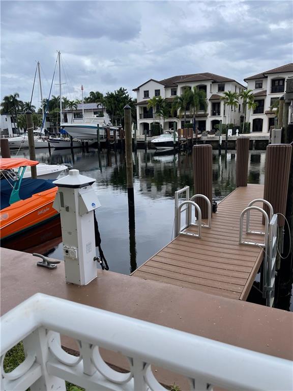 Location, location, location! This 2 story 3 bedroom 3.5 bathroom boutique waterfront condo is ready for its new owner! This unit features a large family/dining room. There's an additional area off the kitchen which can be used as social/bar area or another eat in/dining area. Upstairs you'll find the main bedroom/bathroom and 2 additional bedrooms both with their own bathrooms. Multiple balconies on both floors. Unit comes with 2 assigned covered parking spaces and a deeded dock. Bring your boat (up to 42') and cruise out to the ocean (no fixed bridges) and enjoy the afternoons in the pool. This boutique building has 14 total units and is maintained well. Located within walking distance to Las Olas shops and restaurants as well as the beach. Use showtime to book your appt.