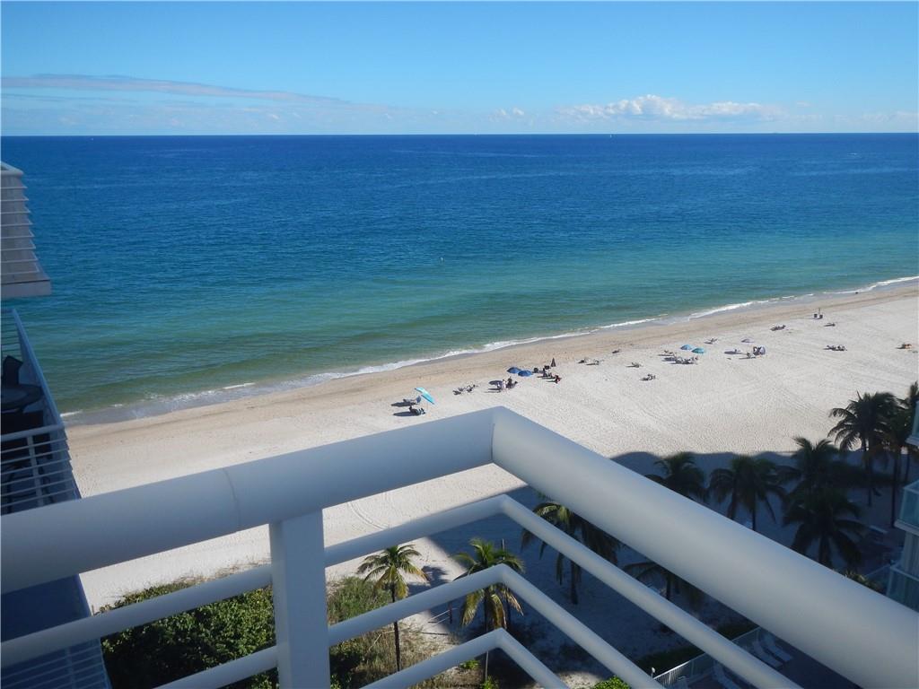 FABULOUS OCEAN VIEWS FROM THIS SW CORNER APARTMENT WITH OVERSIZED, WIDE, WRAP A ROUND BALCONY. THE BALCONY IS APPROXIMATELY 300 SQUARE FEET. LARGE MASTER BEDROOM AND LIVING ROOM. THE APARTMENT HAS BEEN REMODELED (WITH PERMITS) TO EXPAND THE HALF BATH TO A FULL BATHROOM AND CONVERTING THE EXISTING DINING ROOM TO A BEDROOM. THE WASHER AND DRYER ARE IN THE UNIT. NEW AIR CONDITIONER AND HOT WATER TANK 2020. THE APARTMENT HAS IMPACT WINDOWS AND DOORS. THIS PRIVATE SMALL COMPLEX(47 UNITS)ON THE SAND HAS BEEN UPDATED WITH A NEWER LOBBY AND PRIVATE HEATED POOL. ASSIGNED COVERED PARKING(54W)