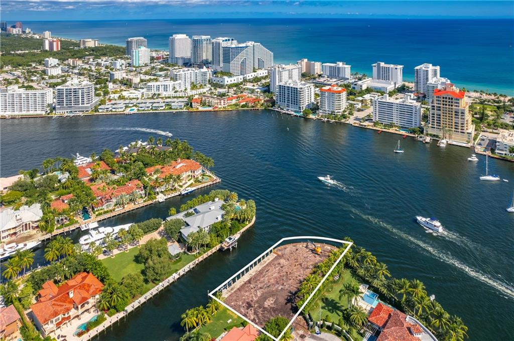 Incredible building opportunity in the highly desirable Seven Isles community! This direct Intracoastal point lot offers stunning views which afford a year round boat parade. Don't miss the opportunity to acquire this unparalleled 19,676 SF lot to build your dream home in the heart of Fort Lauderdale. Being offered with plans. Private & exclusive neighborhood with guard house & 24-hour security patrol. Easy ocean access & 283' of water frontage with mega yacht dockage, perfect for the avid boater. Just minutes away from the Beach, dining, shopping & the Airport.