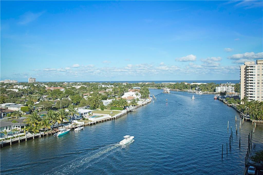 Sweeping views of Intracoastal Waterway overlooking Lighthouse Point, at Hillsboro Inlet. Natural light filters throughout this corner unit with panoramic views of waterways, intracoastal homes, and boats passing by. Impact Windows & Doors, Newer Hot Water Heater, private beach access membership upon request (see hillsboroshores.com) Community pool/ paver patio (that includes canopied area) overlooks intracoastal. Owner has fully paid $10,000 assessment. Laundry facility on each floor.