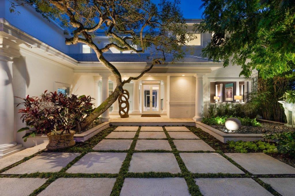 Stunning transitional waterfront estate located in prestigious Sunrise Key. Upon entering the home, you are embraced by wide water, Rio Barcelona, views through floor to ceiling glass windows and doors. Preferred southern exposure pours light into this custom estate reflecting on the white marble floors throughout. Modern Poggen Phol kitchen with Miele appliances including a 120-bottle wine refrigerator. Four generous ensuite bedrooms one of which doubles as a VIP suite with its own living room, breakfast bar, and private entrance. Primary bedroom with sitting area has floor to ceiling glass with spectacular panorama views and private balcony. Three car garage, 95' ipe dock and heated swimming pool. Dockage for large yacht, no fixed bridges with direct ocean access.