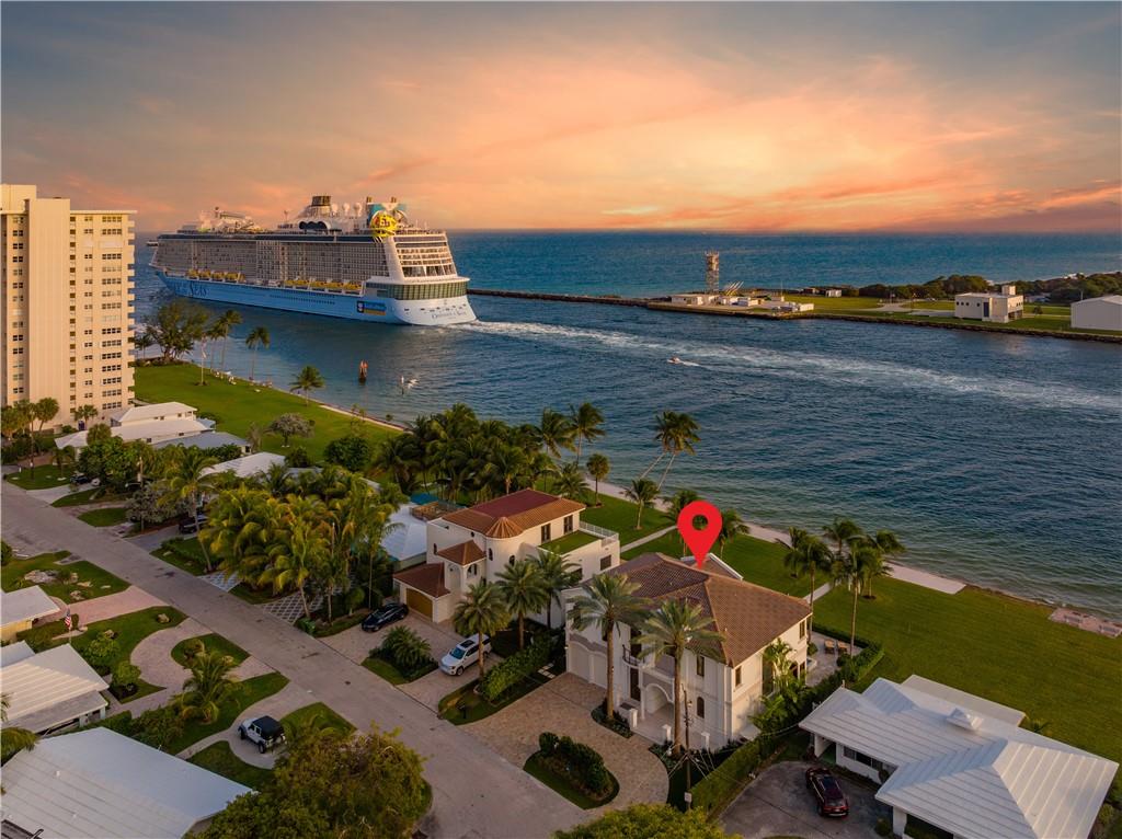 BREATHTAKING PANARAMIC VIEWS IMMEDIATELY CAPTURE THE SENSES AS YOU ENTER THIS ONE OF A KIND PALATIAL ESTATE PERCHED DIRECTLY ON THE PORT EVERGLADES SHIP CHANNEL!! SWEEPING VISTAS THRU THE WALLS OF GLASS LEAD THE EYES FROM THE OCEAN, ACROSS TO THE STATE PARK, TO THE INTRACOASTAL, ALL THE WAY TO THE PORT & FEATURE A SPECTACULAR, NEVER ENDING PARADE OF LUXURY YACHTS, CRUISE SHIPS, SAILBOATS, NAVY VESSELS, DOLPHINS, TURTLES, & MARINE WILDLIFE!! TRULY A UNIQUE & COVETED FT. LAUDERDALE EXPERIENCE FROM A RARE CUSTOM BUILT, NO EXPENSE SPARED MASTERPIECE PROPERTY READY FOR IMMEDIATE OCCUPANCY!! EXPLORE THE BEST BEACH FROM YOUR BACKYARD W/ DEEDED BEACH RIGHTS & RELAX IN THE HUGE HEATED POOL AT THE CLUBHOUSE!! MASSIVE BEDROOMS & BATHS (2 WATERFRONT), GYM.
