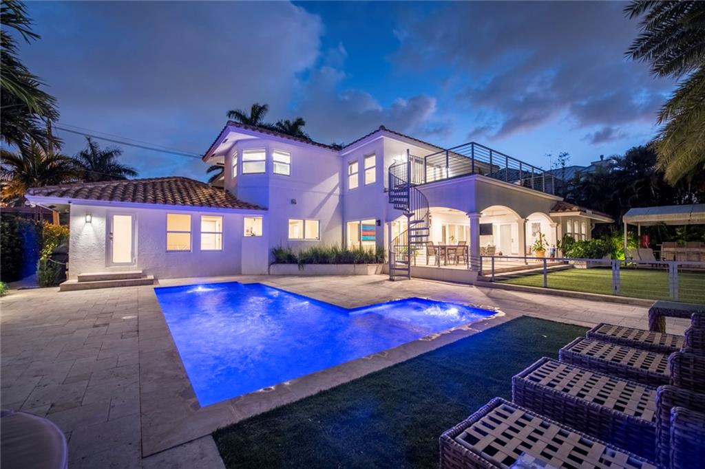 $1,000,000 PRICE REDUCTION 6/16/2022 & TENANT JUST MOVED OUT! RENOVATED TRANSITIONAL ESTATE HOME! PRESTIGIOUS LAS OLAS LOCATION IN PRIME SEVEN ISLES NEIGHBORHOOD WITH GUARDED COMMUNITY! WALK TO BEACH OR DOWNTOWN/LAS OLAS! 1/3 ACRE PRIVATE OASIS! 100' NO FIXED BRIDGE DOCKAGE! BRIGHT AND OPEN FLOOR PLAN! LARGE OPEN KITCHEN FEATURES DOUBLE OVEN, ISLAND WITH COOKTOP AND HOOD.  AMAZING BACKYARD WITH OUTDOOR SUMMER KITCHEN AND TROPICAL POOL AND A REAL YARD WITH COVERED LOGIA FOR GRAND SOUTH FLORIDA LIVING!  LANDSCAPED FOR PRIVACY!  NEW 100FT DOCK/SEAWALL WITH A 12,000 POUND LIFT!  WHOLE HOUSE GENERATOR AND WIND RATED WINDOWS AND DOORS!  THE PROPERTY IS MORE SPECTACULAR IN PERSON! COME TOUR THIS STUNNING RESIDENCE OF DISTINCTION TODAY AND BE BLOWN AWAY!