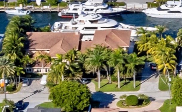 OWNER SAYS MAKE AN OFFER. YACHT HAVEN. RARE 160 linear feet, deep water, best protected storm refuge & quickest ocean access in Ft Lauderdale. DOCKAGE FOR 150' yacht. Bonus is IMPECCABLE 7000 sq ft mansion. 6 bedroom, office & home theatre. Garage could accommodate 6 cars, room to add garage space for large car collection. OPEN FLOOR PLAN & HIGH CEILINGS. Chef's kitchen, center island bar, dining room & great room, fireplace. Luxurious master suite, fireplace & spa-like bath. Separate captain quarters apartment.Tackle room, outdoor kitchen. Large pool, full cabana bath. Service drive to dock. Safe secure all-waterfront neighborhood minutes from shopping, restaurants & conveniences. 5-STAR INTERNATIONAL YACHT CLUB across waterway WITH TENNIS & other amenities. Close to Las Olas the beach.