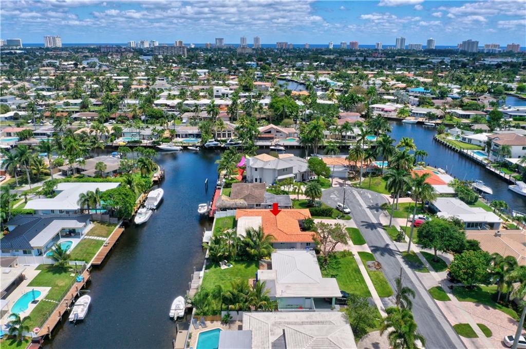 Waterfront living at its finest with this spectacularly appointed 3/2 home in Cypress Harbor! One fixed bridge w/12' clearance at high tide. This completely remodeled waterfront home features: ALL impact windows, 2010 Roof, 2018 AC, 2020 Water heater, 1 car garage w/circular driveway, tile in kitchen & formal dining room, laminate floors thru-out, family room, updated kitchen w/SS appliances & granite counters and large laundry room w/full size washer/dryer. Enjoy the hot summer nights on your open patio overlooking serene water views. Dock your boat right in your backyard! Minutes from the newly revitalized Pompano Beach Pier w/restaurants, beaches & shopping. Best of all NO HOA! You don't want to miss this! Waterfront living at its finest with this spectacularly appointed 3/2 home in Cypress Harbor! One fixed bridge w/12' clearance at high tide. This completely remodeled waterfront home features: ALL impact windows, 2010 Roof, 2018 AC, 2020 Water heater, 1 car garage w/circular driveway, tile in kitchen & formal dining room, laminate floors thru-out, family room, updated kitchen w/SS appliances & granite counters and large laundry room w/full size washer/dryer. Enjoy the hot summer nights on your open patio overlooking serene water views. Dock your boat right in your backyard! Minutes from the newly revitalized Pompano Beach Pier w/restaurants, beaches & shopping. Best of all NO HOA! You don't want to miss this!