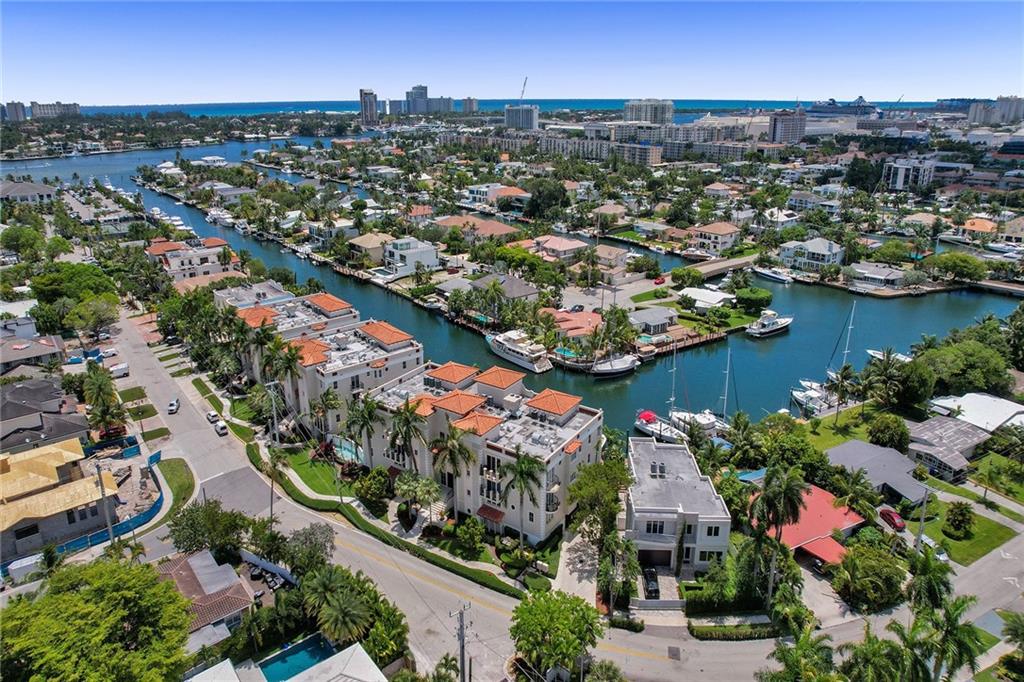 Beautiful Waterfront Condo With over 2,000sq of spacious living in East Fort Lauderdale, the 2 bedroom /2.5 bath extra large condo with a DOCK. This corner unit has tons of natural lighting, marble flooring, Stainless Steel Viking appliances, a natural gas range, granite countertops, beautiful custom bathrooms, amazing water views from all rooms, balconies are off each room, huge walk-in closets and floor to ceiling impact doors and windows, Covered Parking 2 spots, washer/dryer in unit, Beautiful custom furniture. Extra Large Storage unit right outside of unit.  Dockage.  This is conveniently located near restaurants, shopping, fort lauderdale beaches, minutes to all major highways and the airport.  Minutes from Las Olas.  This is a beautiful Furnished Rental. All Utilities Included.