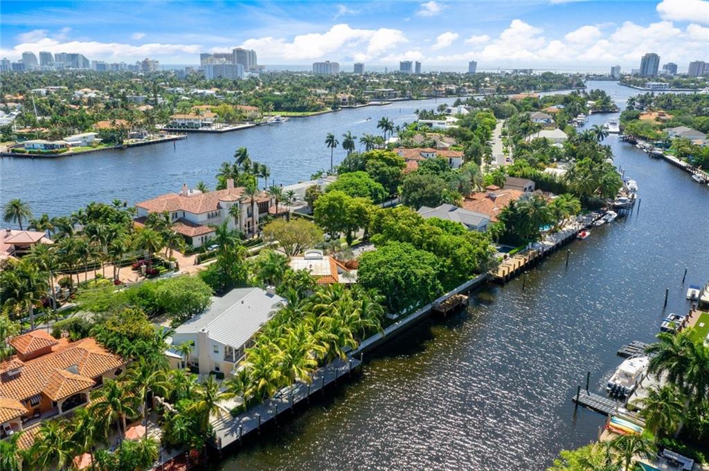 Classic Palm Beach inspired custom renovated waterfront residence. Tucked away on most desirable street in Rio Vista with quaint tree-lined sidewalks. 100'± deepwater dockage, wide turning basin, minutes to ocean access making this perfect for the avid boater’s S Fla lifestyle. The home itself is purposefully situated on a spectacular 12,500±SF lot to enjoy the Southeastern tropical breezes. The 4,300±TSF of living space features 5 bedrooms, 4.2 baths with interior decor by Palm Beach designer Tom Scheerer. The spacious outdoor area surrounds the tranquil pool & spa creating an outdoor oasis with plenty of room to entertain family and friends. Conveniently located near fine dining, shopping and just a 15± minute drive to the FTL International Airport. Don’t miss this one - priced to sell!