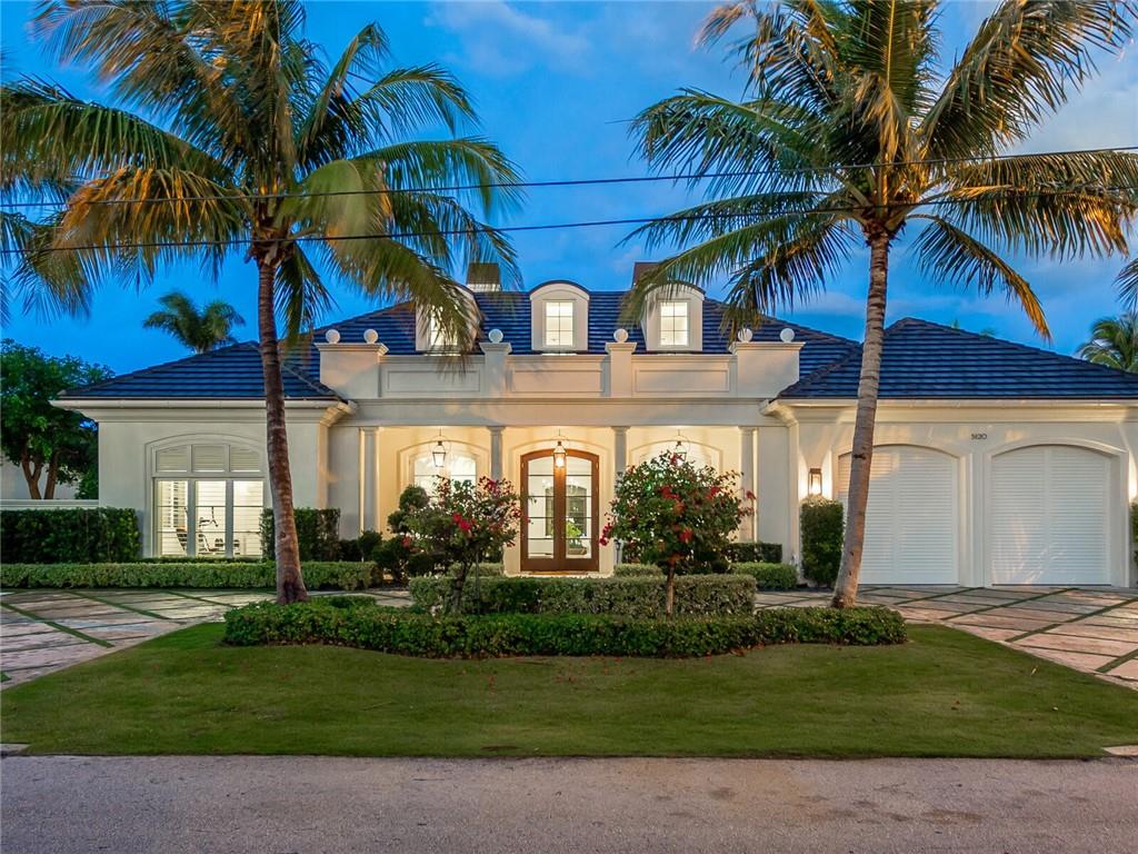 This stunning intracoastal front home was a new build finished in 2017.  The 5 bedroom 4 1/2 bath home has wonderful living spaces with great views from the entire home and even a peak at the ocean from 2nd story balcony.  Architech, Carlos Martin is know for his timeless style.  This home is finished with with a coastal contemporary style ready for fun waterfront living. The club room with a full bar is a great place to gather for pool, darts and watching a big game.  The photos will show the downstairs master with an attached office all with wide water views.  One other bedroom is also on the lower level.  Upstairs encompasses 3 more bedrooms with 2 full baths, a bar with sink and fridge and a full living area.  The upstairs balcony is one of everyone's favorite hang outs.