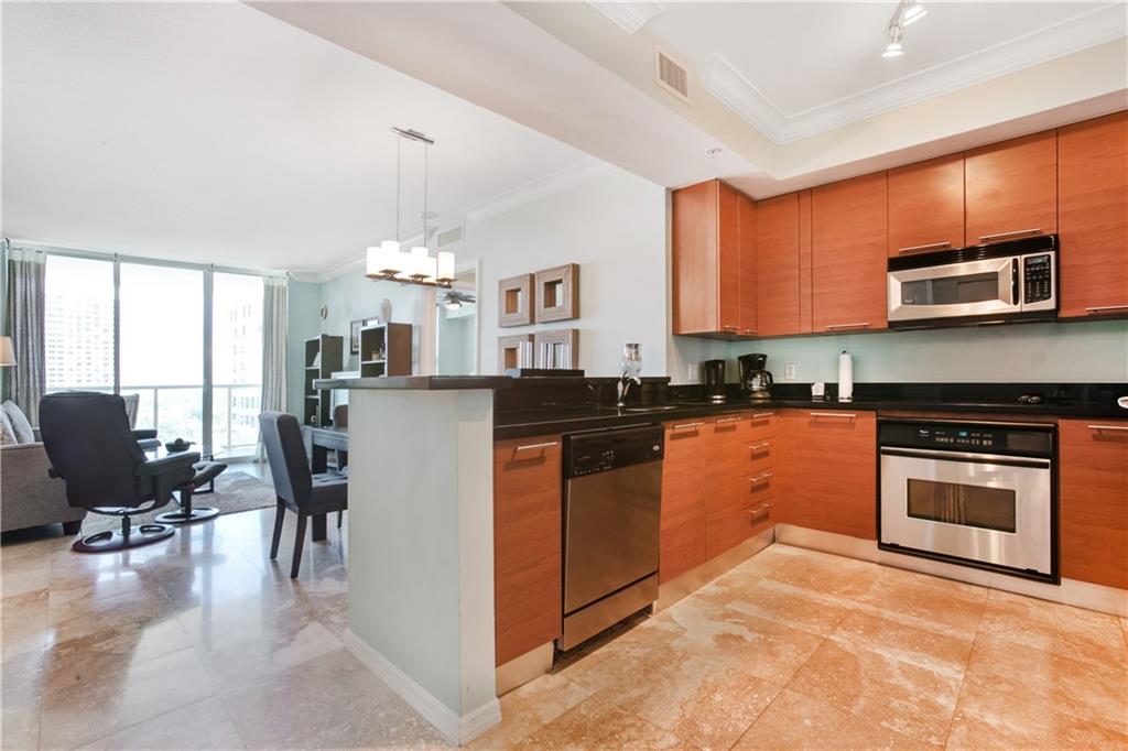 Welcome home! Beautiful annual furnished lease (6 months may get considered), 2 bedroom split, 2 baths at 350 Las Olas Place, steps of Las Olas Boulevard in downtown Fort Lauderdale. Open gourmet kitchen, fully equipped with new refrigerator, microwave, dishwasher (being installed, photos show old ones), plenty of cabinetry & counter space plus pantry. Primary bedroom has a king size bed, secondary bedroom a queen size bed. The primary bathroom features a spacious marble dual sink vanity, separate shower, tub & marble flooring. Walk-in closets in both bedrooms. Great parking spot on the 4th floor. 350 Las Olas Place is a full-service building w/ rooftop swimming pool, gym, valet, etc. Rent includes high speed Internet (Comcast), HBO & Showtime, hot water. New washer/dryer.