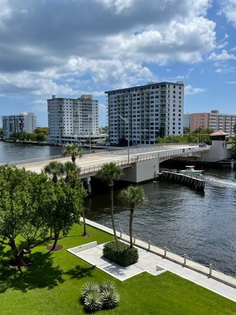 This 2 bedroom/2 bath condo is waiting for an owner to give it a renovation and reap the rewards of a fantastic intracoastal view. Large 12x6 foot balcony faces north, over looking the intracoastal waterway, with views of the lovely tropical grounds. Both bedrooms have views of the intracoastal. The primary bedroom has 2 walk in closets. Full size washer & dryer is located between the second bedroom and bathroom. Beautiful pool area has a resort like feeling and sits directly on the intracoastal, with truly beautiful intracoastal views. BBQ area near the pool. One assigned garage parking space in the garage. Pet friendly building, up to 2 pets, 25 lbs or under per pet. Just a short walk over the Atlantic intracoastal bridge to get to the beach. A quick walk over the bridge to the beach.