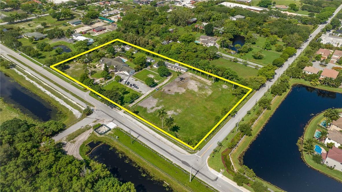 Unlimited Potential at this Rare 5+ Acre Equestrian / Farm Ranch House, located in Coconut Creek adjacent to 625 acre TradeWinds Park with Equestrian Trails. Main living quarters is full 4 bed / 3 bath / 2 half bath / Separate Living Room, Dining Room, Family Room, Office, Laundry Room, Covered Lanai leading to Outdoor Kitchen & Pool / Portico offering covered parking and oversized 2 car garage / 5 Stable Barn / Chicken Coup / 2 mini or pony stables / plus detached Efficiency & separate detached Conv. Cottage. Property purchased together with Adjacent Vacant Lot $1m Offers Owner or Developer Opportunity to Build New. Live off the grid, be 100% food, water & energy independent! For the savviest qualified real estate investor inquire with listing broker for specifics Taxes only $500 year City Sewer & Water Hookup Available. Efficiency and Stables has private Laundry Room