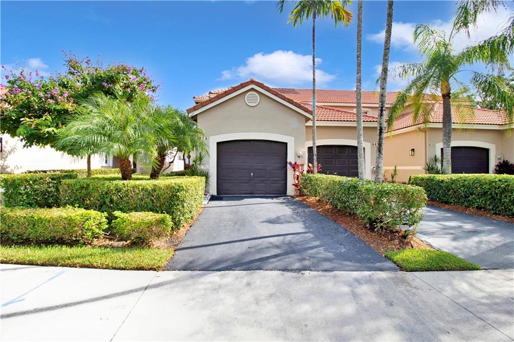This property is located in the beautiful gated community of San Remo in Weston. It features 2 bedrooms, 2.5 bathrooms, volume ceilings, 2 walk in closets in both bedrooms, both bedrooms are en-suites with bathrooms in them! 2 year old A/C, 2 y/o washer and dryer,  storage area, 1 car garage, a screened patio & more! The community features basketball courts, a pool, & child play area! Close to highways & shopping ! Will sell quickly , don't wait !