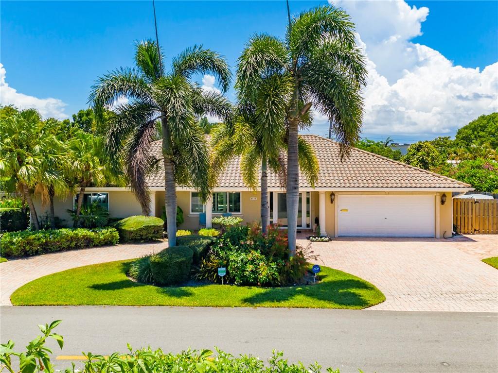 Lovely family home in sought after Coral Ridge Country Club. 3/2 open floor plan with large covered patio. Lovely pool area with pergola to enjoy outdoor living. Impact glass throughout, gas heated pool and gas range. Home has many upgrades with lovely wood flooring. Close to hospitals, schools and shopping. Move in ready. This house will not last long