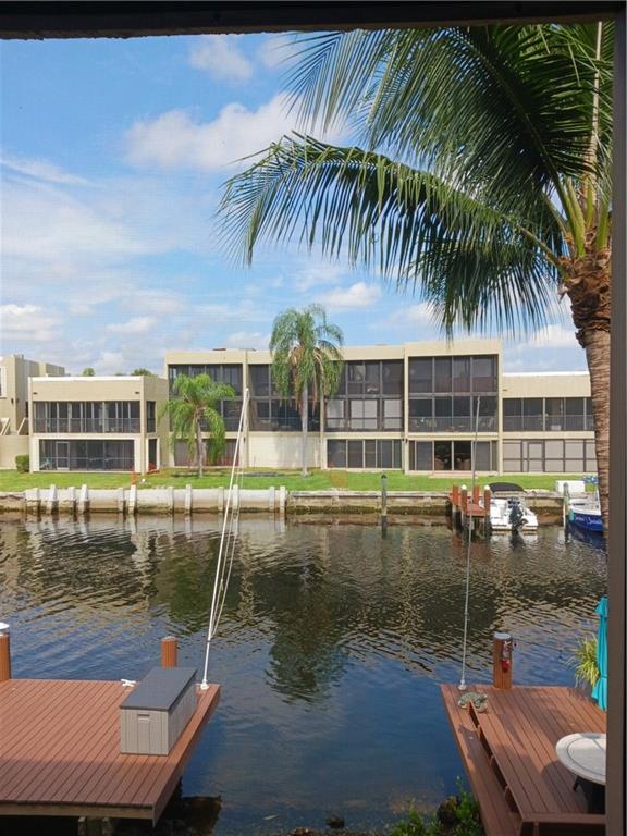 Great opportunity at a great price to make this two bedroom two bathroom waterfront condo your own!!! This waterfront community features 24 hour gated/guarded security, courtesy bus, billiard room, function hall, tiki huts, putting green, card room, etc. Close to beaches, shopping, dining, and golfing!