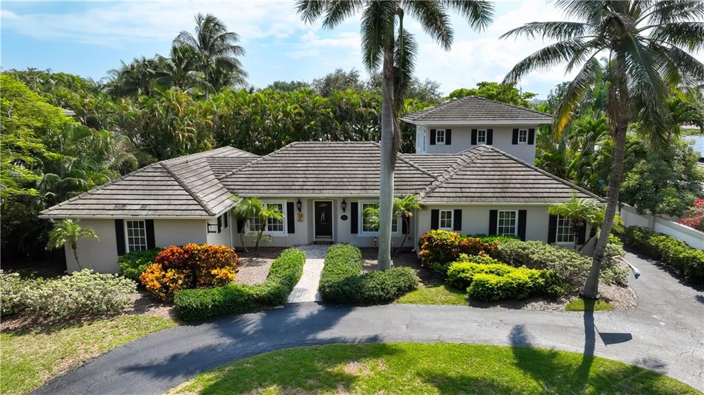 2 Cayuga Ln, Sea Ranch Lakes, FL 33308