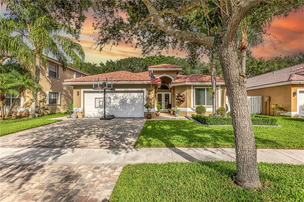 MODERN, ELEGANT, & COZY, THIS HOME HAS IT ALL, BOASTING COMPLETE INTERIOR UPGRADED REMODEL SITUATED IN PRIME LOCATION WITH NEARBY HIGHWAYS, SHOPPING, & ENTERTAINMENT.  HOME'S INTERIOR FEATURES OPEN QUARTZITE KITCHEN, HUGE CENTER ISLAND, SS APPLIANCES, PROFESSIONAL GAS STOVE, 32 INCH PORCELINE TILE THROUGHOUT, CUSTOM SPA-LIKE BATHROOMS, LIVING ROOM ELECTRIC BLINDS, CUSTOM DOORS & CABINETRY THOUGHOUT, AND MANY MORE. OUTSIDE AWAITS YOUR TRANQUIL OASIS FEATURING LUXURY MODERN SMART POOL WITH 3 WATERFALLS & 12 PERSON IN-POOL SPA WITH GLASS TILED SUN DECK, COVERED PERGOLA, BRAND NEW OUTDOOR KITCHEN, & NEW LANDSCAPING & LIGHTING. COMPLETE IMPACT WINDOWS, SLIDERS, & FRONT DOORS ADD PROTECTION & SECURITY. NEW SPRINKLER SYSTEM, GUTTERS THROUGHOUT, & PVC PRIVACY FENCE ALSO ADDED. TRULY MOVE-IN READY