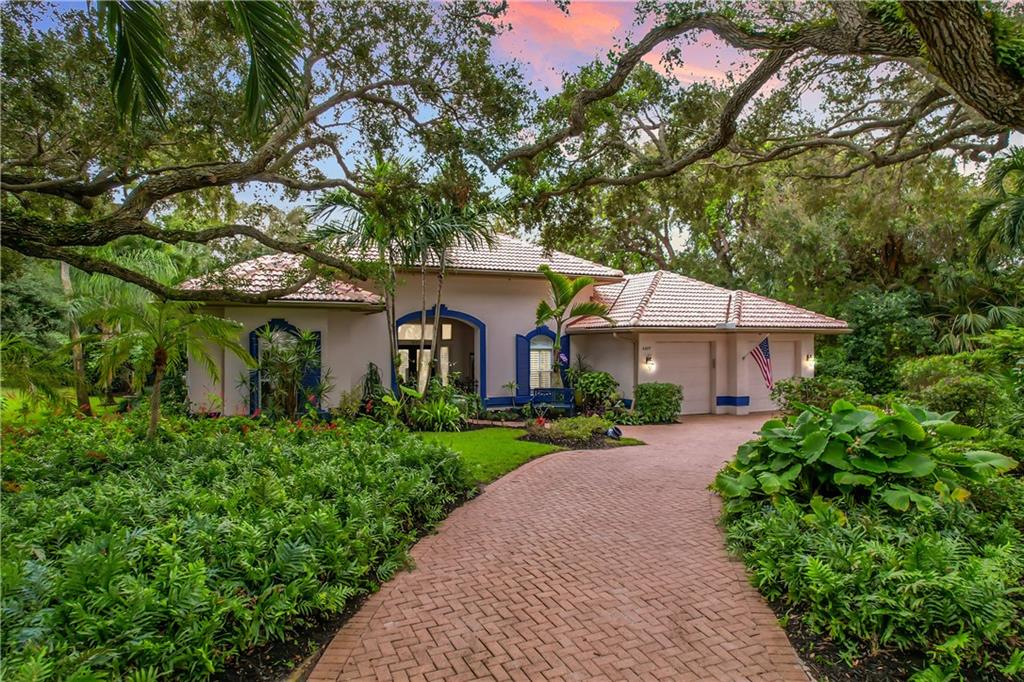 DRAMATIC PRICE IMPROVEMENT!! FOR IMMEDIATE SALE. Beautifully remodeled Oceanridge home located east of A1A. Built by Arthur Ruttenberg this home has an open floor plan with volume ceilings that is open to the outdoor screened pool and patio. 2021 tile roof, newer tile floors, kitchen and appliances, updated baths, a/c and marble pool pavers and outdoor lighting. Three a/c split and garage also a/c. Freshly painted inside. All under a beautiful canopy of oaks and lush landscaping. Stunning!  Take your morning coffee to the beach! Short stroll through this gorgeous neighborhood to deeded beach access.
