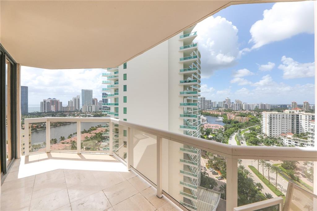 This is your chance to own a unit in the iconic Landmark building that allows you to do the condo living at its finest. 22nd floor. Meticulously cared for unit with elegant marble floors in main areas, floor to ceiling windows in all rooms & 2 large balconies with irresistible panoramic views. Ocean, City, Intracoastal, Golf... & don't forget the breathtaking sunset views! The kitchen offers views with plenty of storage. Spacious & bright rooms. Unique and refined 1950sqft. floorplan. Washer & dryer in the unit. Located on Country Club Dr. on the intracoastal water way, close to the ocean, restaurants, shopping, beach & more. The building is guard gated, 2 parking spots, tennis, heated pool, jacuzzi, sauna, gym, access to city bus, valet, steam room, storage, etc. Live above the crowd!!