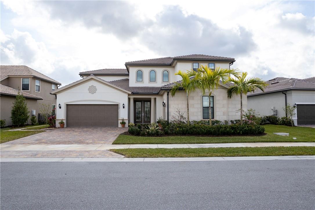 Welcome home! This elegant and beautifully appointed “Garden Vista” model built by DiVosta has a coveted open and airy floorplan comprised of 5 bedrooms, 4.5 baths, and a 3-car garage.  Features include an upgraded gourmet kitchen with granite countertops and custom marble backsplash, stainless steel appliances, custom wine rack for the wine lover, crafted molding and baseboard throughout the home, elegant spiral staircase, extended primary bedroom with custom marble fireplace, California closets in all rooms plus kitchen pantry, office, loft, saltwater pool and spa, outdoor lighting, security system and putting green.  This home truly has it all and is an entertainer’s dream!