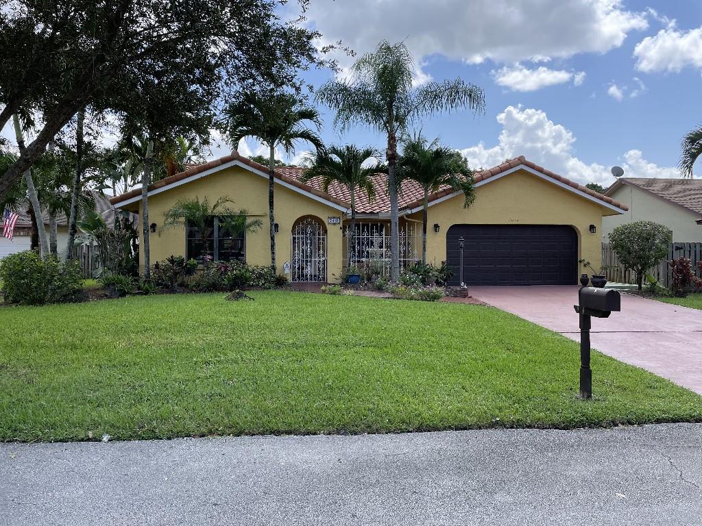 7010 NW 39th Pl, Coral Springs, FL 33065