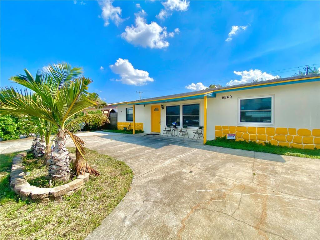 This spacious 3 bedroom 2 bath home offers a great layout for families and entertainment. Open kitchen, separate laundry room, large bedrooms and a huge screened in patio. Terrazzo floors throughout. Big private fenced in backyard with a detached shed. Circular driveway offers lots of parking. This property has so much potential. Great location, walking distance to Target, shopping, and restaurants. Being sold AS IS. Call now for more information and to schedule your private showing.