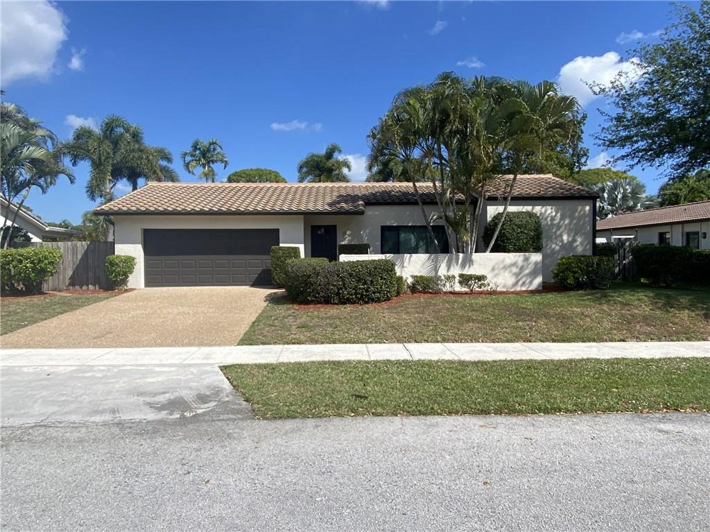 Great opportunity to make this house your own in much sought out Timber Creek neighborhood. This 3/2 home features impact windows and doors, enclosed patio, fenced in backyard, roof installed in 2020, 2 car garage. Master bedroom slider opens up to patio and this home features a built fish tank. Centrally located near Town Center Mall and all major highways. Zoned for A rated public Schools and close to 2 private schools. Community tennis courts and playground