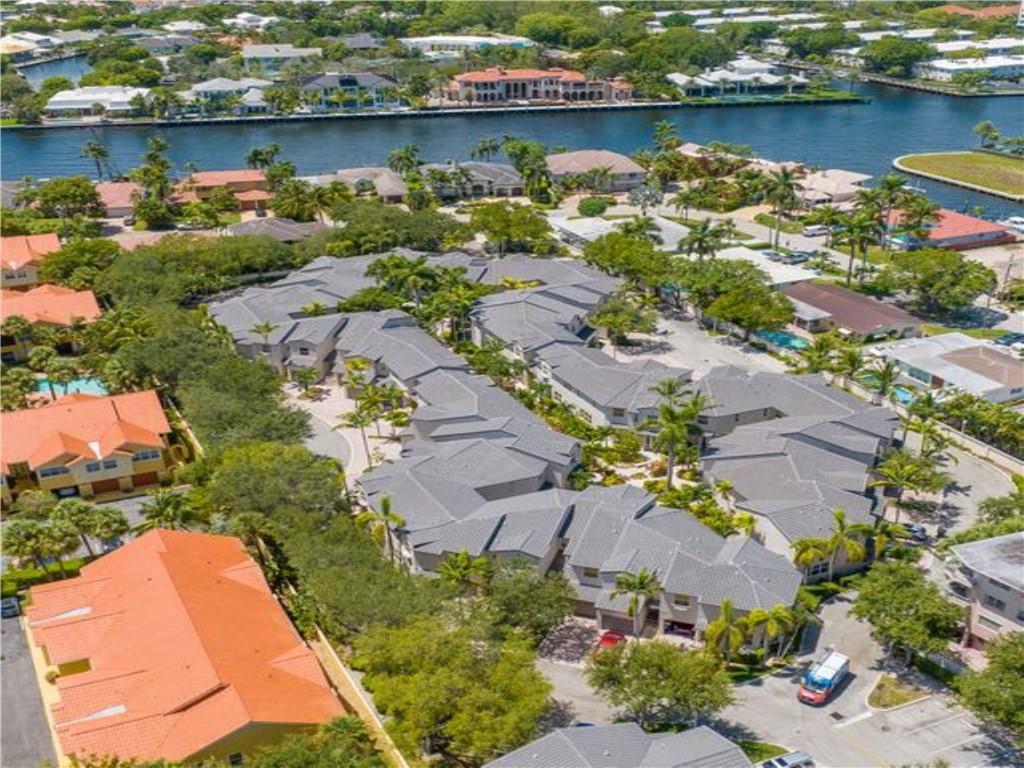 Welcome to the Gated Beachside Complex of Ocean Walk Villas.  This Boutique Townhome Community offers just 47 units and is within walking distance to the Town beaches and Shops /Restaurants of Sea Ranch and Lauderdale by the Sea Village.  This Corner unit offers additional Window Space.  Association Pool.  Well Maintained Unit but ready for some upgrades.   Priced accordingly.  Association Replaced roofs in 2021.   Ocean Walk Allows Two Pets any size, no aggressive Breeds and Allows rentals first year of ownership, one time per year a min of 90 days.  Offered Furnished. Second Floor offers Small Open Den Area.  Master Bedroom has Volume Ceilings and Two walk in Closets.  Added Bonus...Brand New A/C May 1, 2023