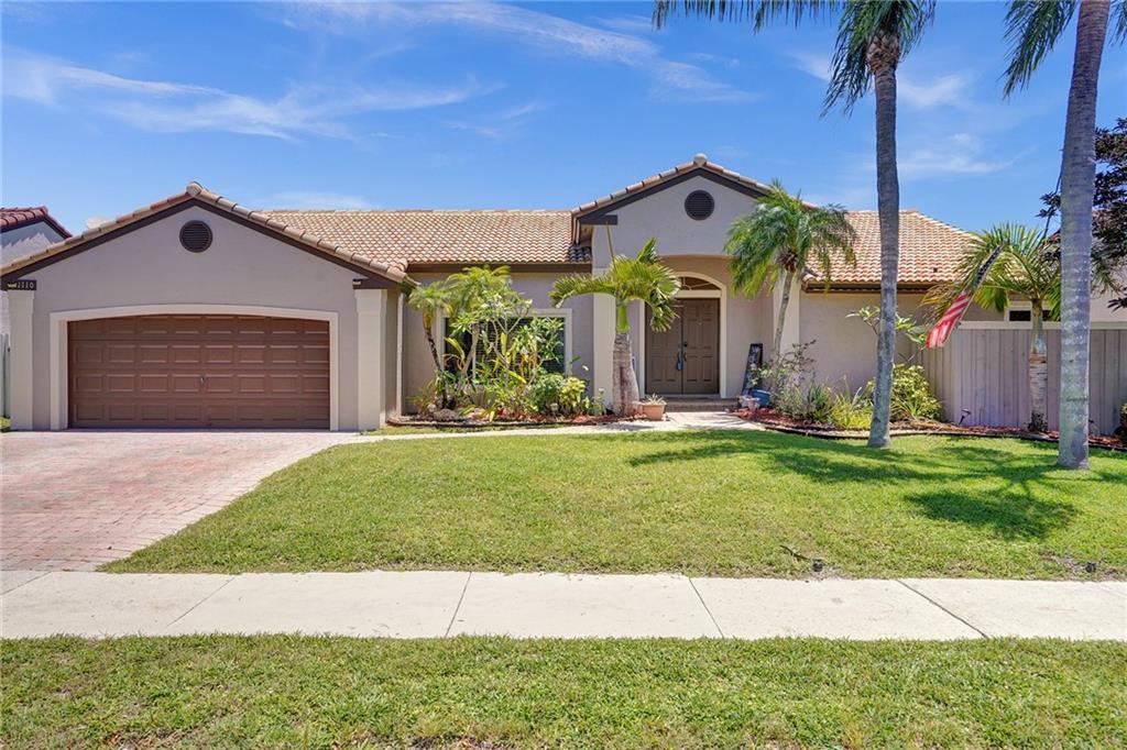 Beautiful Home in Desirable neighborhood!  4 Bedrooms, 2.5 Baths.  Completely remodeled kitchen with high end stainless steel appliances, granite counter tops and custom cabinets.  Under counter lighting.  Hurricane rated windows and doors.  Amazing and spacious back yard with a heated pool and spa and covered patio area.  Vaulted ceilings and recessed lighting throughout.  Newer Roof, New electrical panel, Newer AC, New hot water heater.  Living room, dining room and family room.  Separate Washer & Dryer room with pantry.  Tile and hardwood floors.  Large master suite with soaking tub, separate shower, separate commode, & large walk-in closet.  Large 2 car garage.  Good to excellent public schools.
This is a must see home!!!! No HOA approval required.   Just an interview.