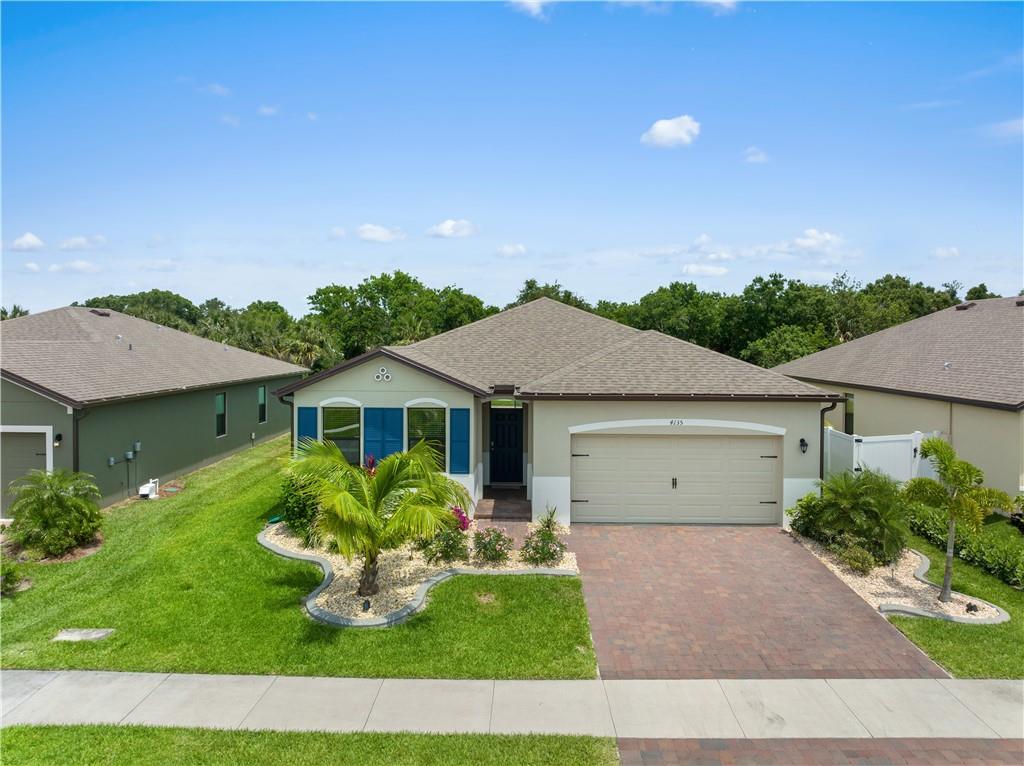 Experience luxurious Florida living in this stunning 4 bed 2 bath pool home in Lost Tree Preserve. Enjoy your chef’s kitchen boasting stainless steel appliances, granite countertops, and plenty of cabinet/countertop space including a spacious island. Open floorplan with plenty of room for your guests and entertainment. This smart house has tons of upgrades including upgraded light fixtures, kitchen backsplash, and brand-new carpeting. Paradise awaits in the fully fenced backyard complete with a lanai, heated/cooled 28x14 saltwater pool and spa, and immaculate landscaping. Community amenities include access to the clubhouse, pool & fitness center.