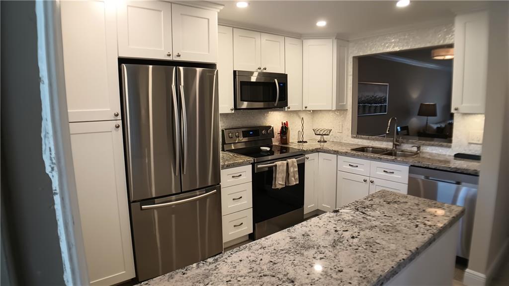 PROPERTY CAN ALSO BE RENTED FURINSHED!!!!  This top floor two bedroom two bathroom condo has been tastefully remodeled from top to bottom. Updated include a restructured kitchen with stainless steel appliances and granite counter tops, two designer bathrooms, porcelain tile floor throughout, crown molding, California closet,  and plantation shutters. In addition, the property is being rented tastefully furnished. Association amenities include 24 hour manned security, 2 heated pools, function room, tiki huts, billiard room, card room, putting green, ping pong table, fire pit, etc. 
Centrally located to shopping, fine dining, Greg Norman signature golf course, and newly re-designed Pompano Beach Pier! Association requires a 700+ credit score.
Cable/300mbps internet included.