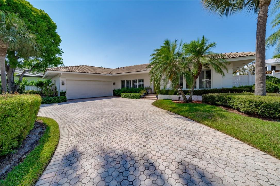 9 Mendota Lane, Sea Ranch Lakes, FL 33308