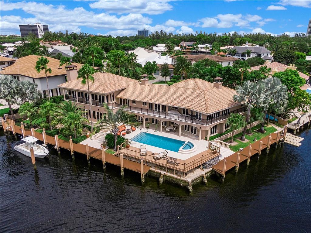 The epitome of luxury living in the exclusive guard gated community of Bay Colony. This remarkable residence is on a corner lot with the most desired SE exposure, nestled on a serene cul-de-sac with OVER 225FT of pristine intracoastal water frontage with direct ocean access for those seeking breathtaking views. The house is equipped with high impact glass and doors throughout, elevator, 2 laundry rooms, 2 master suites, cozy fireplace, gas stove, 2 dishwashers, ample storage, 2 car garage and a fenced in backyard. In this extraordinary home, luxury living is elevated to new heights. Embrace the unparalleled beauty of Bay Colony and experience a life of luxury, comfort and security in this truly exceptional residence. Westside neighbor sold for $9M last year.