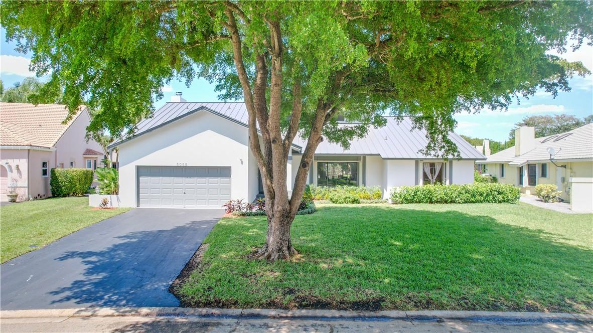 5055 NW 84th Rd, Coral Springs, FL 33067