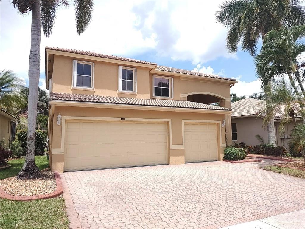 BEAUTIFULLY UPDATED 4 BEDROOM 3.5 BATH AND 3 CAR GARAGE HOME WITH A LAKE VIEW IS WAITING FOR ITS NEW OWNER! FEATURES OF THIS HOME ARE UPDATED KITCHEN AND UPDATED MASTER BATHROOM, GRANITE KITCHEN COUNTERTOPS, DRY BAR, TILE FLOORS ON THE FIRST FLOOR, HARDWOOD & CARPET FLOORS ON THE SECOND FLOOR, SCREENED PATIO WITH PLENTY OF SPACE, NICE SIZE SPA/POOL, ACCORDION SHUTTERS, A GENERATOR CONNECTION READY, AND MORE. THE MAIN MASTER BEDROOM IS ON THE FIRST FLOOR. THERE IS A SECOND MASTER BEDROOM ON THE SECOND FLOOR. HOA DUES ARE ONLY $185.00 A MONTH INCLUDING FAST 1 GB FIBER INTERNET. THE GATED COMMUNITY OFFERS A COMMUNITY POOL AND A FITNESS CENTER. CLOSE TO PROMENADE MALL, SHOPPING, AND THE TURNPIKE. A NEW GENERATOR CAN ALSO BE SOLD.