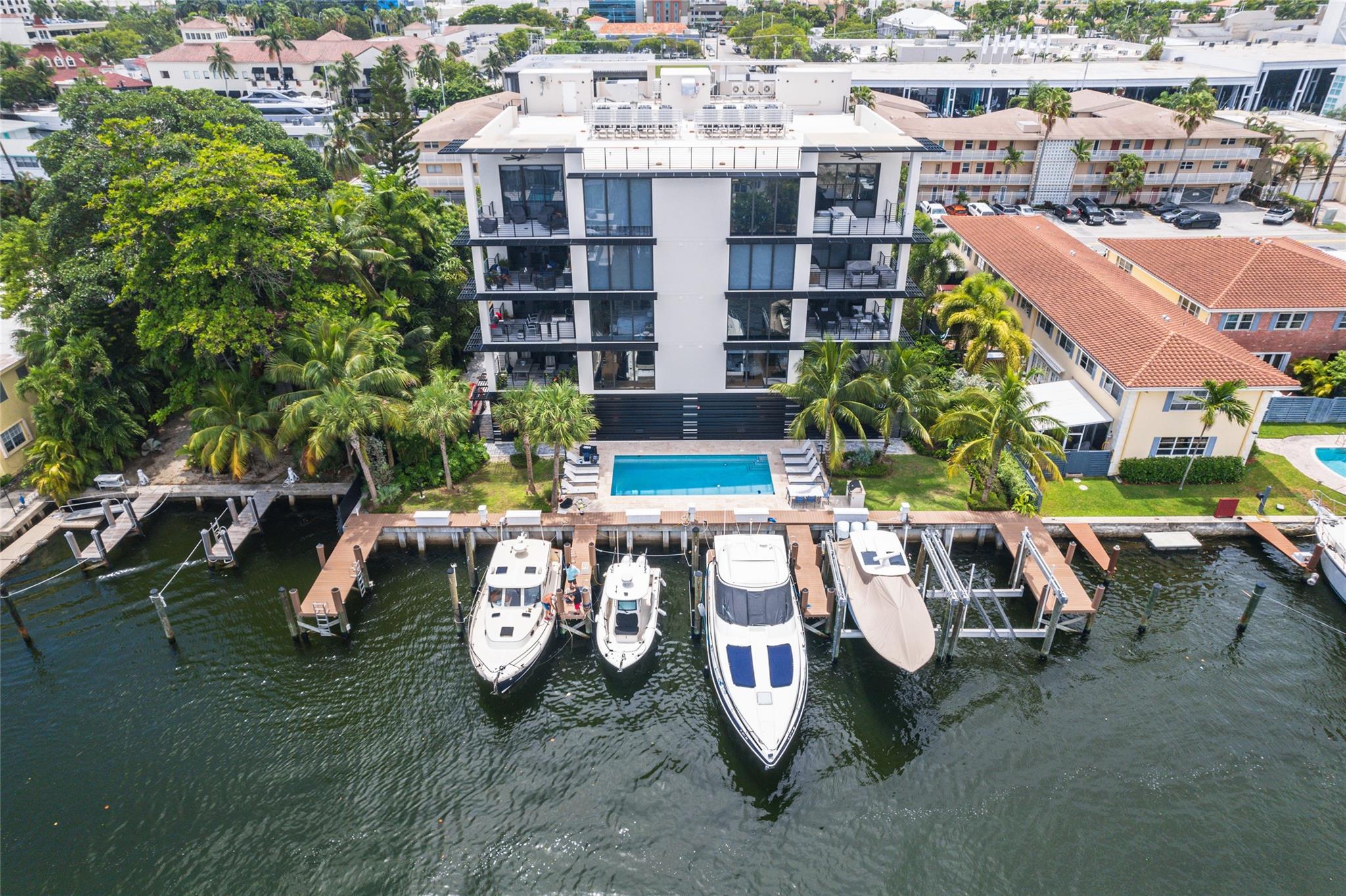 Harbors Edge - Newly Built 2022 - 3BD |3BA | Sq Ft 2,372 Stunning boutique community in the heart of Fort Lauderdale’s elite yachting community. Gorgeous corner unit professionally decorated and furnished by one of the areas top interior designers w/ large private waterfront terrace. Enjoy exquisite sunsets and spectacular city views. Floor to ceiling UV impact glass. High end fixtures, chefs kitchen w/Thermador, Fisher Paykel appliances, spacious living & dining area w/ impressive views, walk-in closets, walk-in pantry, enthusiast wine tower, and fabulous bedroom views. Custom glass interior wall w/ barn door, new built- ins for office, storage. Building is equipped w/emergency generator, 2 assigned garage parking spots. Minutes from, beaches, FLL airport, restaurants, Las Olas & Downtown