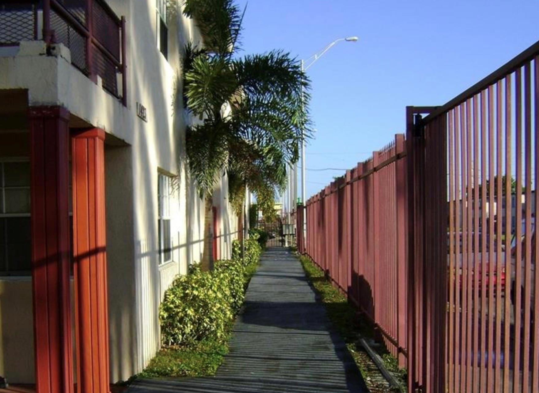 Stunning 3-bedroom, 2-bathroom ground-floor condo, ideal for homeowners or investors. Currently on month to month lease to a reliable tenant for the past 7 years at $1700. Spanning 1,056 sqft, it comes fully equipped with central air conditioning, refrigerator, dishwasher, stove, kitchen cabinetry, spacious closets, blinds, ceiling fans, and lighting fixtures, and one assigned parking space! Close to 95 for easy access to get around town. Lovely community with iron fencing and security cameras!