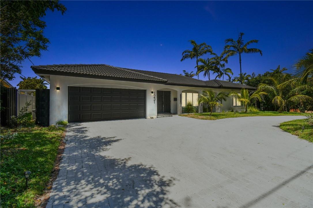 Stunning Boaters Paradise with 80 FT Dock on Deepwater, with No Fixed Bridges to Access Ocean! Start living in your dream home 4 BED/3 BATH with POOL & Newly renovated in the coveted Country Club Isles neighborhood, quiet and beautiful area with view of Harbor Park with children's playground, tennis and basketball courts, and walking trail! Stunning timeless bright and modern style remodel includes large porcelain tile, and recessed lighting throughout the home, bathrooms featuring rain showers and new vanities, central air and the primary room has built-in closet space for additional storage. Sit and enjoy your morning coffee with in the enclosed patio space from your primary room overlooking the pool and canal.