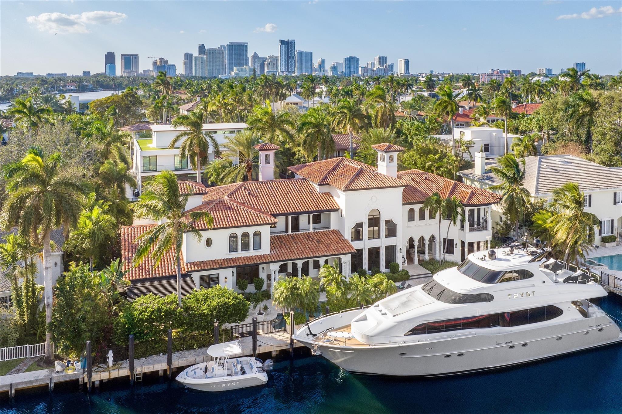 Newly remodeled Euro-modern design combines elegance of Palm Beach mansion with practicality, comfort & livability of Fort Lauderdale waterfront estate. 150' WF, deep water canal & quick ocean access. Unique porte-cochere and circular drive provide grand entrance. Double entrance doors open to stunning staircase & great room, floor-ceiling windows & dramatic view to pool & waterway. Chef's kitchen, butler's pantry & catering area, open to bar, wine cellar, family room & adjoining dining room with fireplace. Private outdoor spa & fireplace adjoin pool & outdoor kitchen. Highest quality materials & craftsmanship: 6 bedrooms, office, home theatre, elevator. Master suite: sitting room, fireplace, 2 bathrooms, steam shower & spa. 4 bay garage for 6 cars, 150 ft dockage.