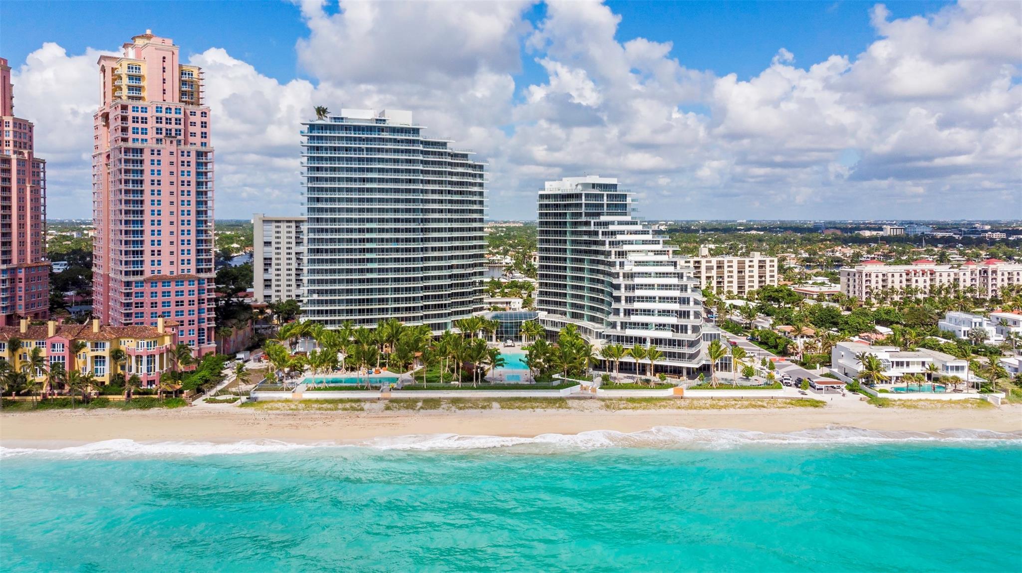 Experience unparalleled luxury in this corner unit at Auberge, distinguished by its unmatched natural light, superior to any other stack in the building, captured through floor-to-ceiling windows / doors. This unit offers views of the ocean and city along with access to 451 feet of private beachfront. 3-bedroom, 3.5-bath residence combines sophistication with comfort. It includes Italian kitchen cabinetry, custom electronic shades, and state-of-the-art LED lighting fully equipped with a cutting-edge Control4 smart system. Custom-built TV units, blending seamlessly with the unit's elegant design. The gourmet kitchen, boasting marble countertops, Sub-Zero and Wolf appliances, and an integrated espresso/cappuccino system. World-class on-site Dune restaurant, with Michelin-starred chef.