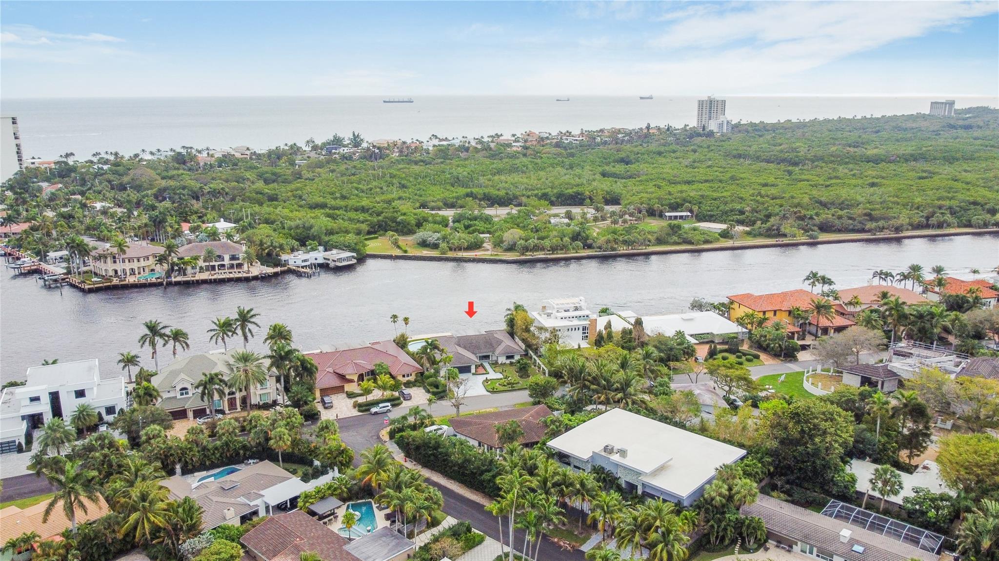 Located on one of the most beautiful, wide and walk able residential streets in Coral Ridge. This 11208 SF lot offers 105 feet WF on your private dock. Enjoy the ocean breeze viewing the expansive Intracoastal  waterway  and the protected wilderness of Hugh Taylor Birch state park!! 2 car garage w/mini split AC unit, large covered porch, in-ground pool, 4 bedroom, 3 full bathroom, open living space with high vaulted ceiling. Newly renovated modern kitchen, impact windows (2019), new (2021) tile roof. Highly rated Bayview Elementary School, walking distance to  Galleria mall and fine dining. VIP front row seats during Fort Lauderdale Winter fest boat parade. Located on one of the most beautiful, wide and walk able residential streets in Coral Ridge. This 11208 SF lot offers 105 feet WF on your private dock. Enjoy the ocean breeze viewing the expansive Intracoastal  waterway  and the protected wilderness of Hugh Taylor Birch state park!! 2 car garage w/mini split AC unit, large covered porch, in-ground pool, 4 bedroom, 3 full bathroom, open living space with high vaulted ceiling. Newly renovated modern kitchen, impact windows (2019), new (2021) tile roof. Highly rated Bayview Elementary School, walking distance to  Galleria mall and fine dining. VIP front row seats during Fort Lauderdale Winter fest boat parade.