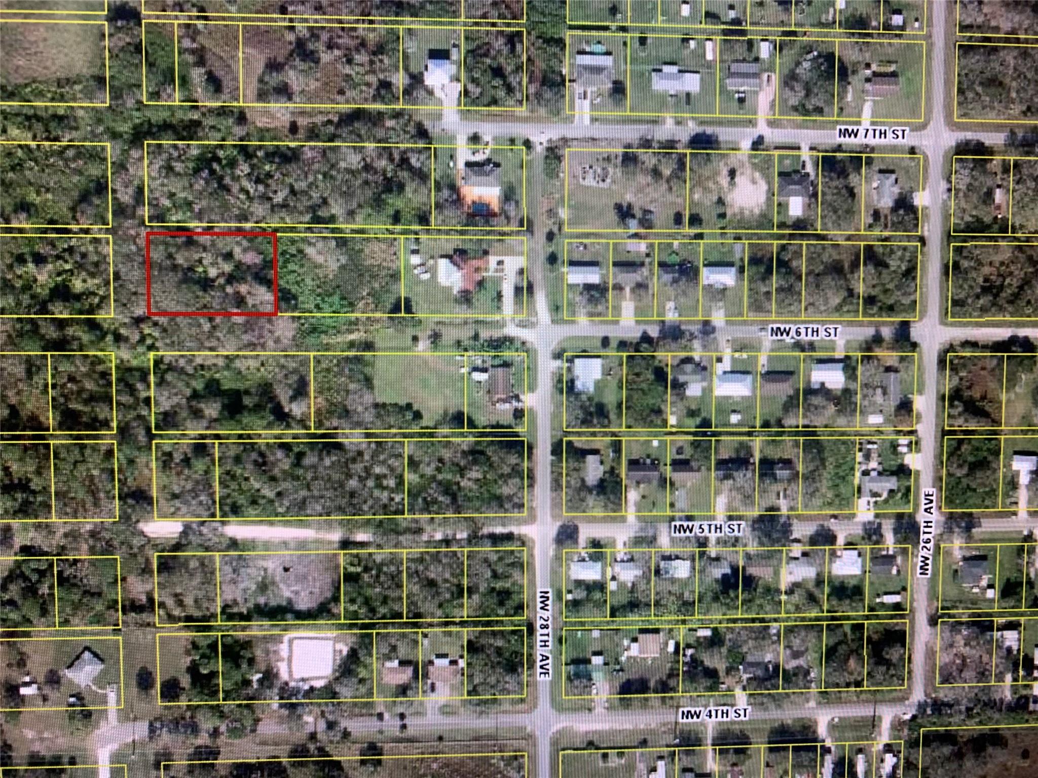 Unimproved land close to Okeechobee. This property is located in Okeechobee Park and is 0.58+/- acres. This land could be split into 2 residential homesites. There is no county road access to this property currently, but it could be built so that you can build homes.