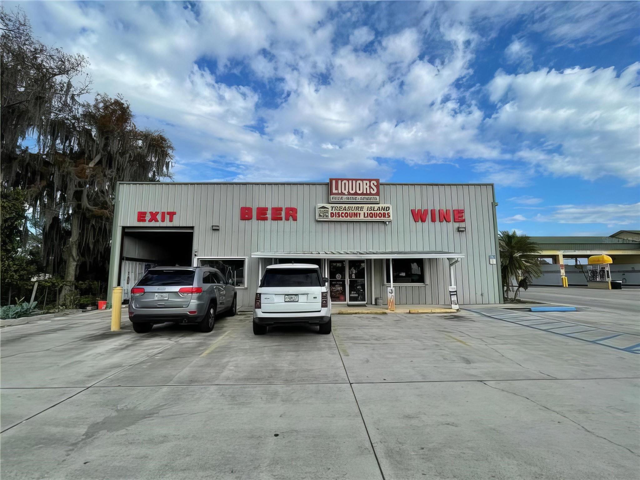 Treasure Island Discount Liquors - Operating Drive through convenient & Liquor store. 100 ft of road frontage , all inventory, equipment and Liquor license included in sale. Building built in 2000, 2366 base sq ft & 3600 Actual sq ft. Call for details on income