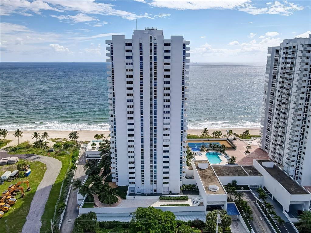 Motivated seller. Major Price Reduction!! Luxury resort living in one of the most beautiful condos in the area. This is a must see. This 1600 sq ft unit has a ocean view from the balcony. This large 2 bedroom /2 bath with a split floor plan, the master bedroom comes with a built-in desk, and impact window have been installed. There are many amenities. They include 24/7 Security, The Sky Lounge where you can enjoy the breath taking panoramic view from the roof top, heated pool, hot tub/spa, sauna, BBQ area, tennis courts, billiards, well equipped workout facility, library and much more.