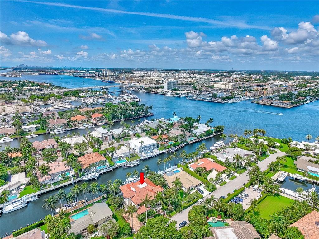 Beautiful 112' of DEEPWATER in one of Fort Lauderdale's most desirable neighborhoods, Harbor Beach. Private beach club & marina. Exquisitely decorated with incredible craftsmanship and detail including hand-painted ceilings and gorgeous custom finishes. Large chef's kitchen. 12,000lb boatlift and the ability to also accommodate a 60'+ boat. This luxury residence includes all ensuite bedrooms, media room, clubroom/lounge with bar, formal dining room, living and family. Master includes office space. Entertain on the covered loggia with most desired southern rear exposure, outdoor BBQ and spa in addition to the wide pool with waterfall. 24-hour neighborhood security.