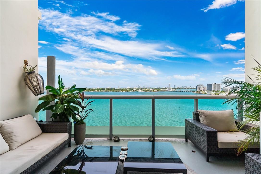 Enjoy the breathtaking views of the bay from this 2 bedroom (plus den), 2.5 bathroom penthouse unit. Cielo on the Bay is a luxury boutique building where each unit features its own private elevator entrance and has multiple terraces to enjoy the unobstructed views of Biscayne Bay. This spacious 2 story unit features updated kitchen with stainless steel appliances, washer/dryer located upstairs, electric custom blinds, and closets with California Closet Systems. Amenities at Cielo include concierge service, a rooftop pool, hot tub, and sun deck, fitness room, community room, and a private marina. This unit comes with 2 garage parking spaces and a storage unit. This building is pet friendly. Enjoy the breathtaking views of the bay from this 2 bedroom (plus den), 2.5 bathroom penthouse unit. Cielo on the Bay is a luxury boutique building where each unit features its own private elevator entrance and has multiple terraces to enjoy the unobstructed views of Biscayne Bay. This spacious 2 story unit features updated kitchen with stainless steel appliances, washer/dryer located upstairs, electric custom blinds, and closets with California Closet Systems. Amenities at Cielo include concierge service, a rooftop pool, hot tub, and sun deck, fitness room, community room, and a private marina. This unit comes with 2 garage parking spaces and a storage unit. This building is pet friendly.